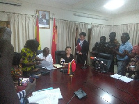 Ken Ofori-Atta signing the agreement with the Chinese government for a Fishing Port at James Town