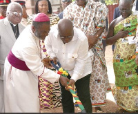 Akufo-Addo together with Bishop Akrofi cutting the sod for the construction of the cathedral