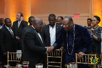 President Akufo-Addo exchanging pleasantries with Archbishop Nicholas Duncan Williams