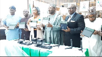 INEC top officials as dem dey launch voter registration kit