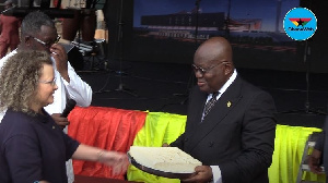 Israel's Ambassador to Ghana, Shani Cooper presenting the stone to President Nana Akufo-Addo