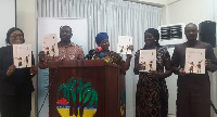 Nana Ohemaa Adwoa Awindor (middle) with some dignitaries at the launch of the report.