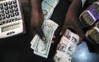 Naira appreciated against the US dollar to close at N410.33 to a dollar