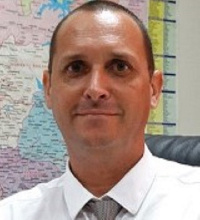 Headmaster of the school, Mr. David Ballieu