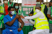 A photo of a person receiving coronavirus vaccine