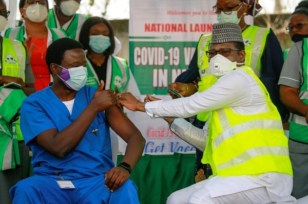 A photo of a person receiving coronavirus vaccine