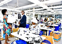 Julian Opuni MD of Fidelity Bank (right) visits SME Customer Cadling Fashion Limited