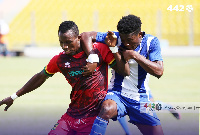 Kotoko's Yussif Mubarik battling Olympics' Samuel Abbey Quaye