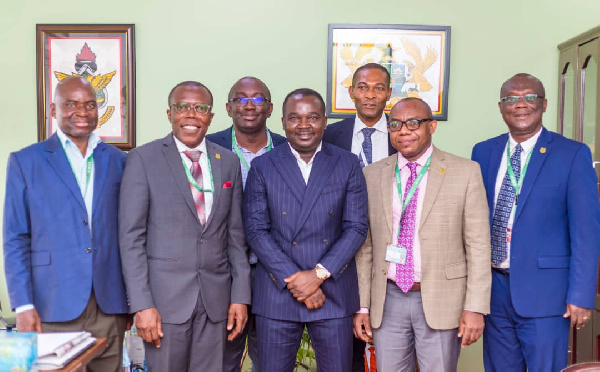 Ernest Appiah MD AMG in the middle with some management members of the University