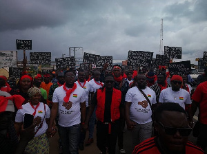 Akoo Nana [middle] with some of the demonstrators