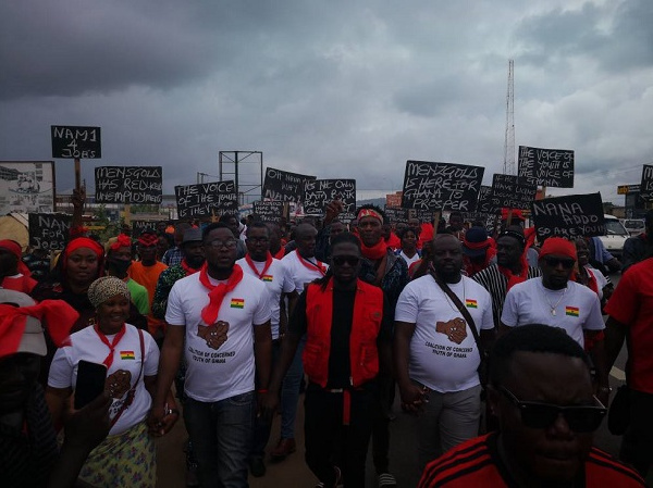 Akoo Nana [middle] with some of the demonstrators