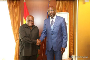 President Akufo-Addo interacting with President-elect of Liberia George Weah