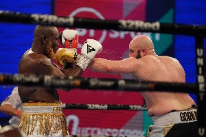 Gorman landing a punch to Lartey's face