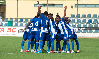 Accra Great Olympics players prepare for a league game