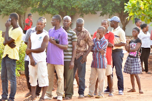 File: Voters in queue to vote