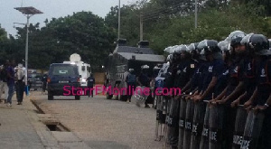 Ghana Police personnel quelling disorderliness at Donkorkrom in the Eastern region