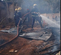 Fire fighters from the Amasaman fire station helping fight the blaze