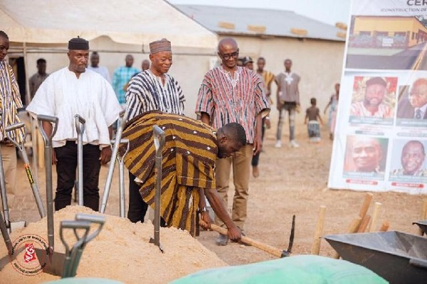 NUGS president breaking ground for the construction of classroom block in Kanania