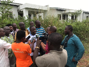 Mr Samuel Agyekum speaking to the press at the site of the Kumawu District Hospital