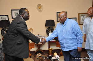 NDP chairman Josiah Aryeh and Nana Akufo-Addo in a handshake