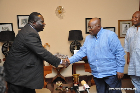 NDP chairman Josiah Aryeh and Nana Akufo-Addo in a handshake