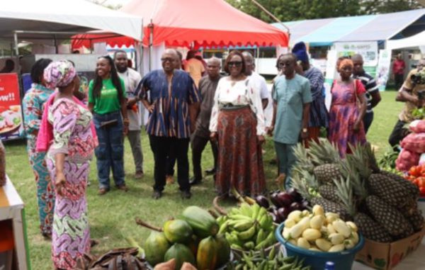 Paul Siameh (3rd from left) and other dignitaries inspecting some of the products at the exhibition