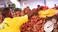 A sweet potato seller in Kimironko Market.