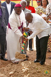 President Akufo-Addo cutting a sword for the construction of the National Cathedral