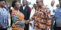 Prof Naana Opoku Agyemang (L) in a handshake with former President John Mahama (R)h (L)