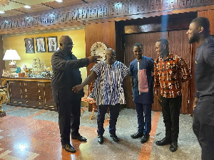 President Akufo-Addo and Joe Ghartey, shaking hands during the visit