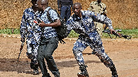 Uganda policemen arrest a journalist in Kampala, Copyright 