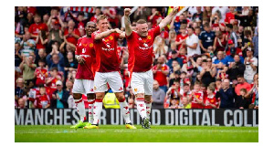 Wayne Rooney celebrates his goal against Celtic.