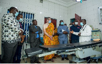 Deputy Minister of Trade Robert Ahomka Lindsay (first left) interacting with medical staff