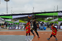 Ghana's power forward attempts to score points