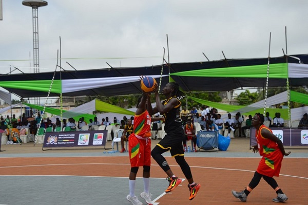 Ghana's power forward attempts to score points