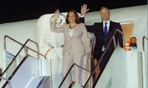 Kamala Harris and Second Gentleman wave as they disembark from Airforce 2