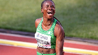 Tobi Amusan celebrates