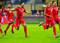 Tunisia players celebrate their victory