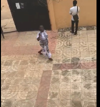 A picture of the woman raining curses on the supposed student