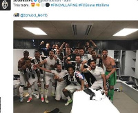 Juventus players with Kwadwo Asamoah celebrate reaching the semi-finals of the Champions League