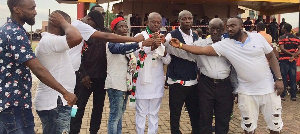 NDC parliamentary aspirant for Asawase constituency,  Dr. Williams Atta Owusu with his supporters