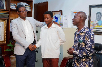 GNPC's Dr Dominic Eduah with Stephen Koomson and father