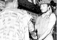 Ft. Lt.J.J Rawlings handing over the reins of government to President Hilla Limann