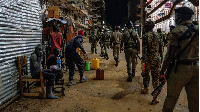 Ugandan police officers and members of Local Defence Units