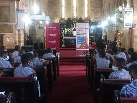 Some students of the Bishop Mixed School during the financial literacy session