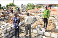 The lower Manya Krobo MCE inspecting one of the ongoing projects