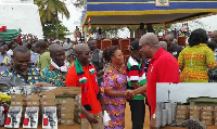 President Mahama sharing outboard motors to fisher folks