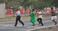 File photo of pedestrians crossing a road