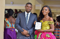 Mr Courage Amese (left) with one of the award winners