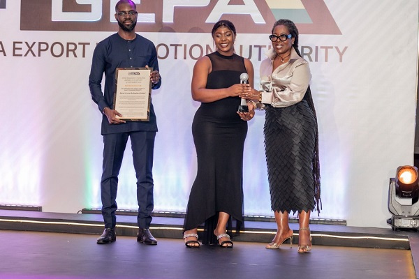 CEO of GEPA, Dr. Afua Asabea Asare presenting an award